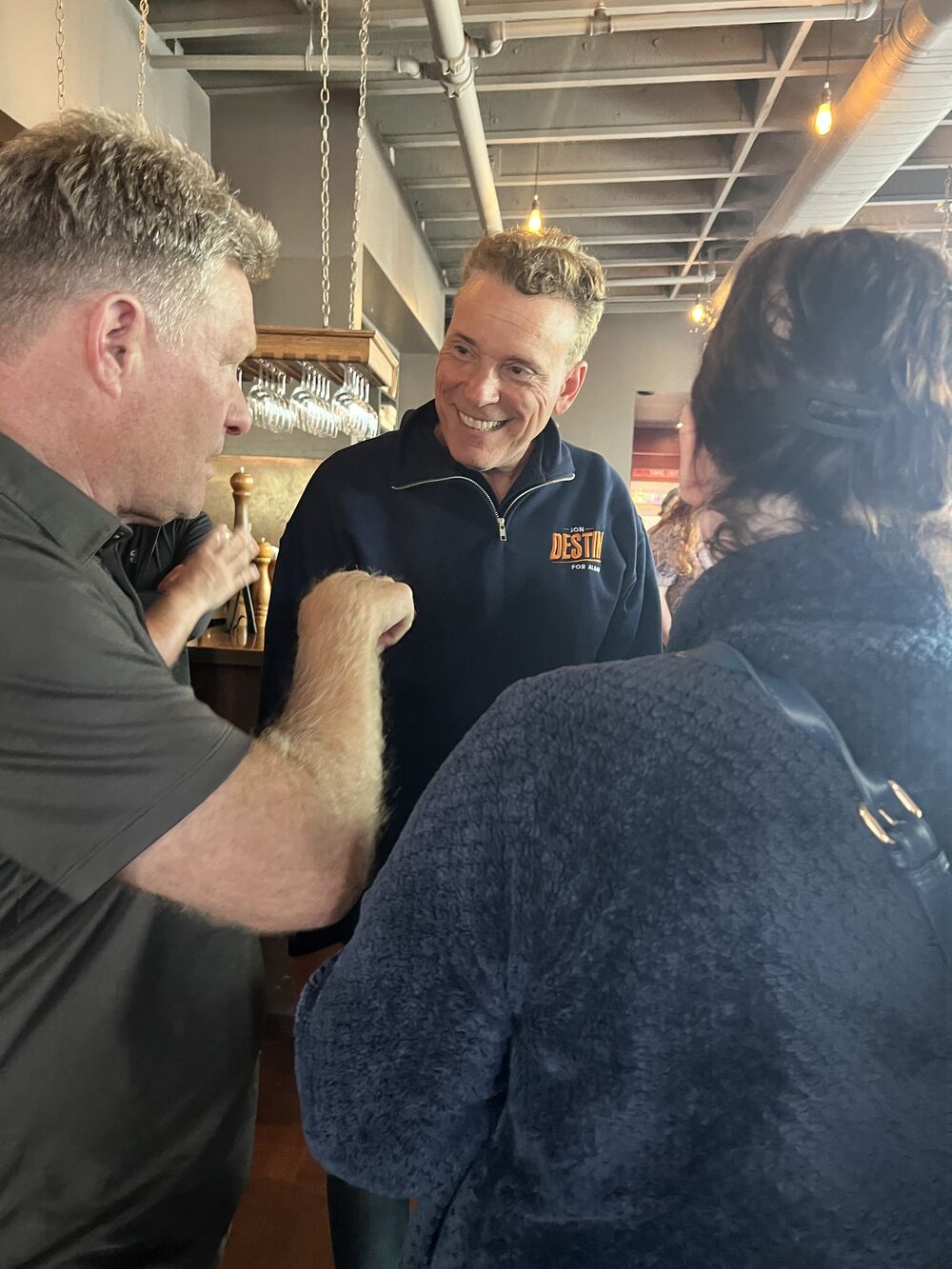 Jon greeting neighbors at Little Star Pizza